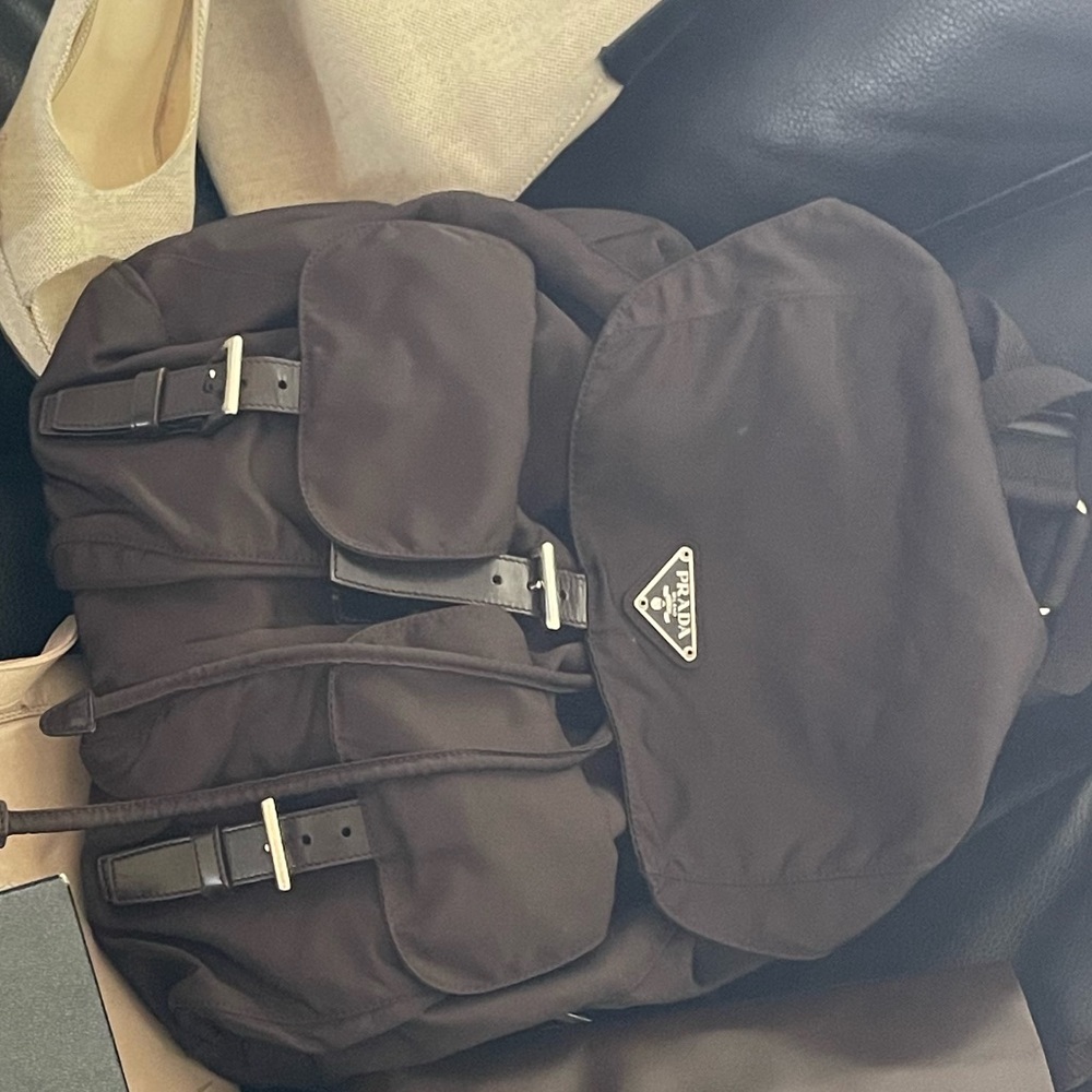 prada nylon backpack with authenticity cards